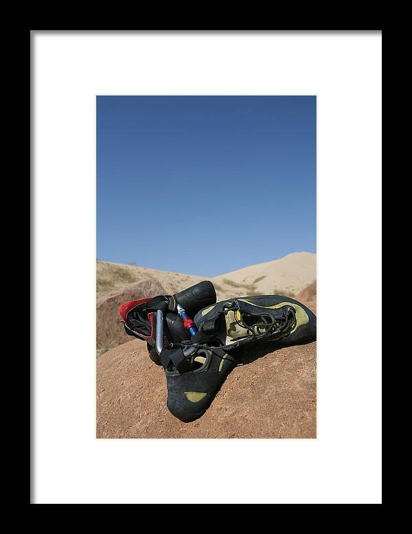 Sand Dune Framed Print featuring the photograph A Hiking equipment on Gobi Desert by MOAimage