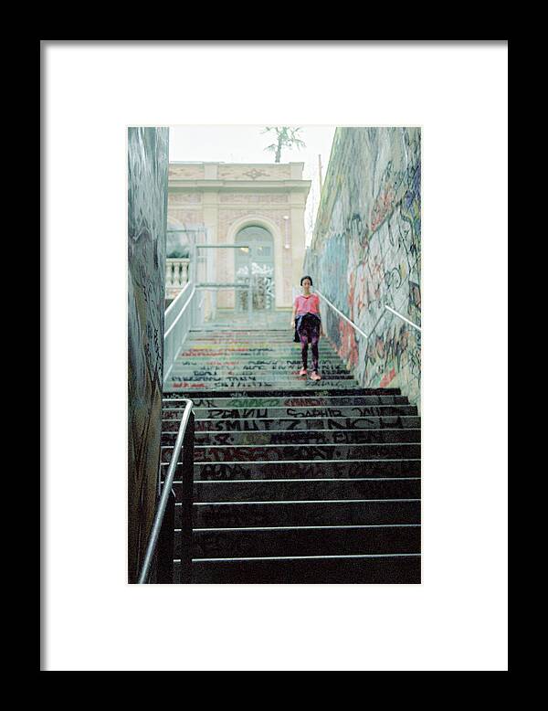Jogger Framed Print featuring the photograph A jogger in the city by Barthelemy De Mazenod