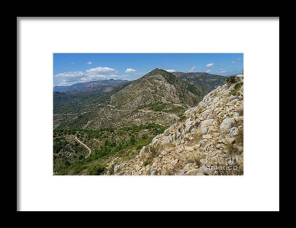 Mountains Framed Print featuring the photograph A long way leads up the mountain by Adriana Mueller