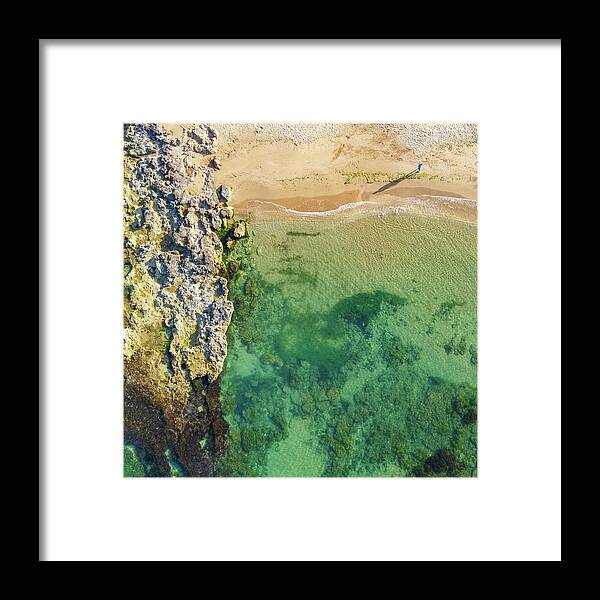 Aerial Framed Print featuring the photograph A stroll along the beach in summer by Mirko Chessari