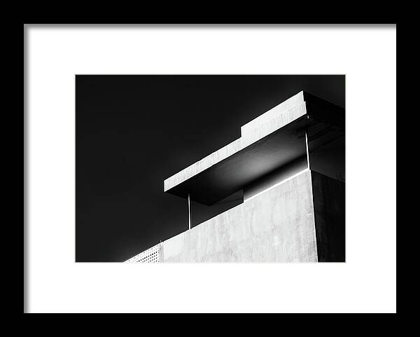 Black And White Framed Print featuring the photograph Abstract architecture design. Black and white futuristic exterior background. Black sky copy-space by Michalakis Ppalis
