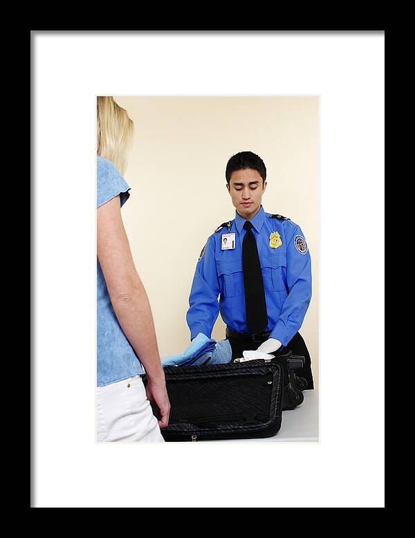 Young Men Framed Print featuring the photograph Airport Inspector by Gchutka