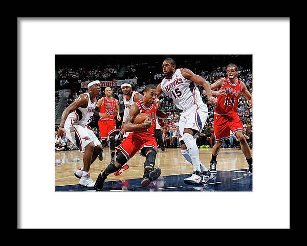Atlanta Framed Print featuring the photograph Al Horford, Joe Johnson, and Derrick Rose by Kevin C. Cox
