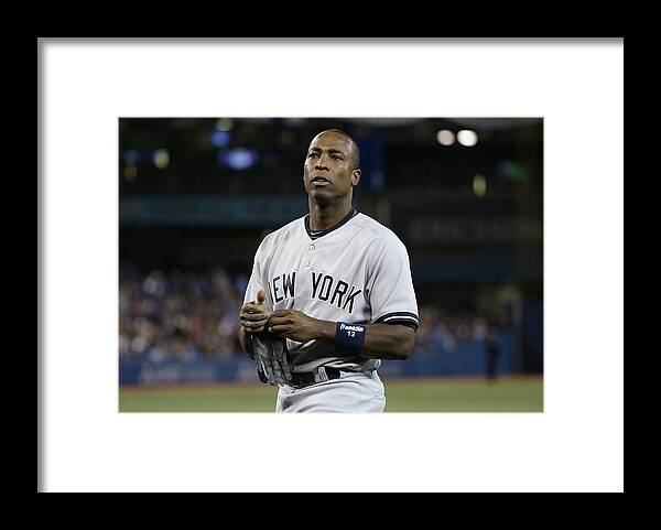 Alfonso Soriano Framed Print featuring the photograph Alfonso Soriano by Tom Szczerbowski