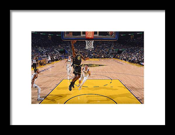 Sports Ball Framed Print featuring the photograph Andrew Wiggins by Garrett Ellwood