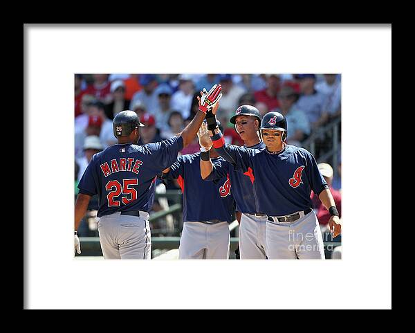Anderson Hernández Framed Print featuring the photograph Andy Marte, Michael Brantley, and Shin-soo Choo by Christian Petersen