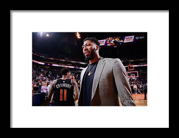 Following Framed Print featuring the photograph Anthony Davis by Michael Gonzales
