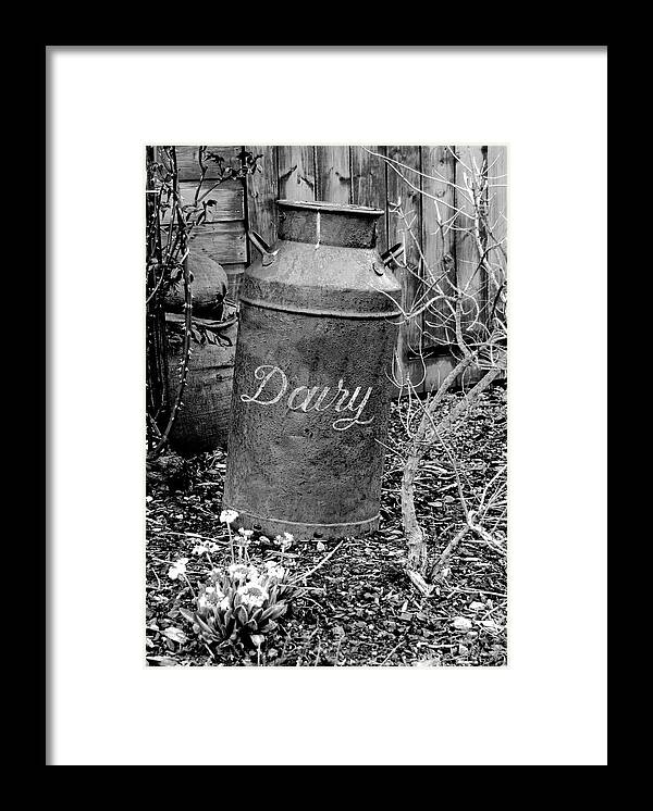 Shed Framed Print featuring the photograph Antique vintage dairy can black and white by Severija Kirilovaite