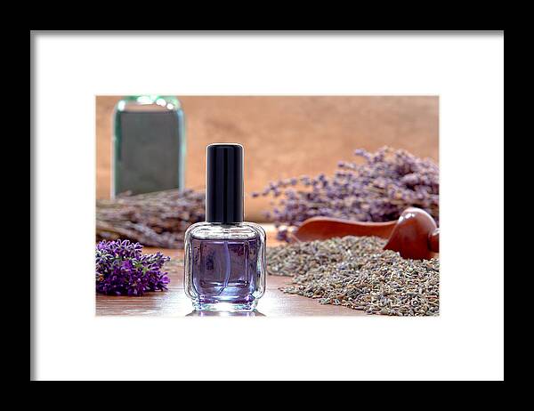 Aromatherapy Framed Print featuring the photograph Aromatherapy Perfume Bottle and Lavender Flowers by Olivier Le Queinec