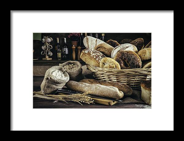Sesame Framed Print featuring the photograph Artisanal bakery: Fresh mixed Bun, rolls and ingredients by Apomares