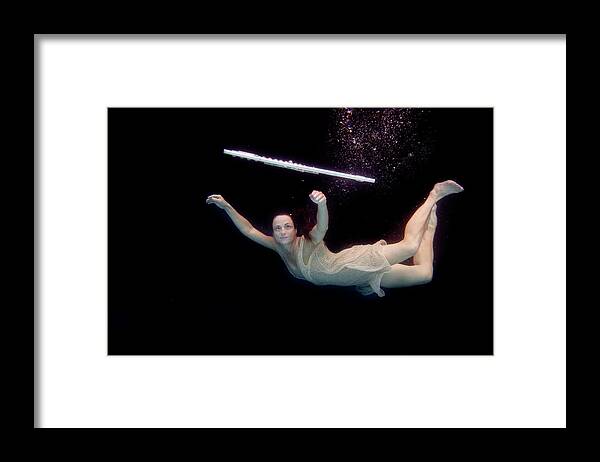Artist Framed Print featuring the photograph Artist magically floating with her flute 61 by Dan Friend