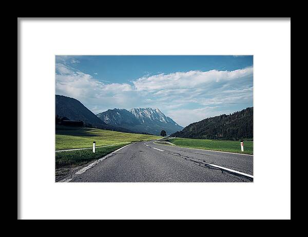 Overcast Framed Print featuring the photograph Asphalt road in Schladming by Vaclav Sonnek