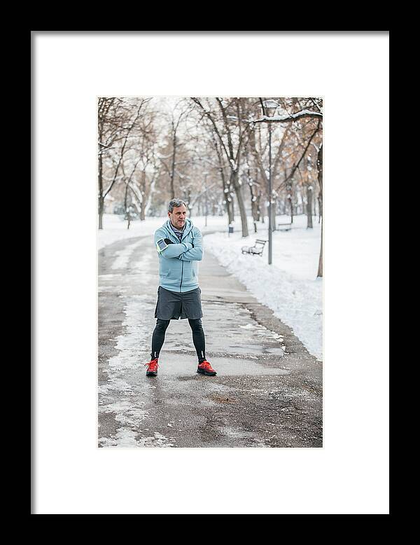 Recreational Pursuit Framed Print featuring the photograph Athlete in public park by South_agency