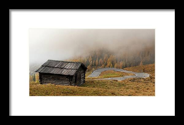 Passo Gardena Framed Print featuring the photograph Autumn landscape with wooden chalet dolomiti Italian Apls by Michalakis Ppalis