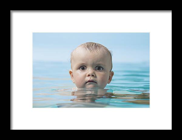 People Framed Print featuring the photograph Baby in water by fStop Images - Vladimir Godnik