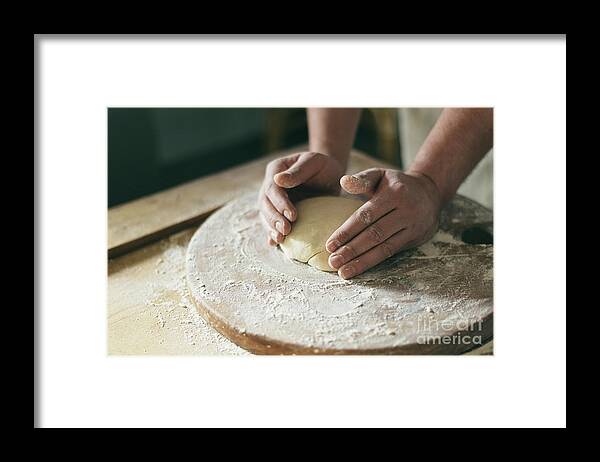 Baker Framed Print featuring the photograph Baker preparing dough closeup by Jelena Jovanovic