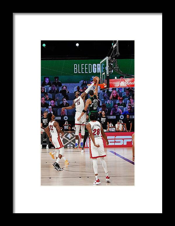 Playoffs Framed Print featuring the photograph Bam Adebayo and Jayson Tatum by Jesse D. Garrabrant