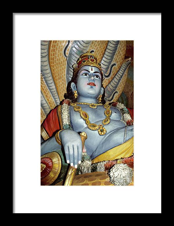 Vishnu Framed Print featuring the photograph Batu Caves sculpture - Lord Vishnu by Sharon Hudson