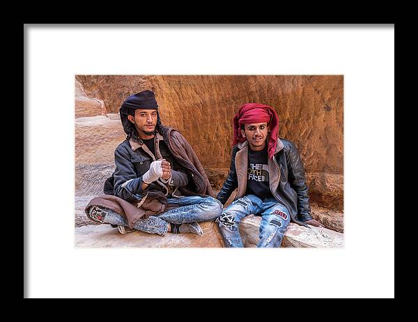 Bedouins Framed Print featuring the photograph Bedouins in the ancient city of Petra by Dubi Roman