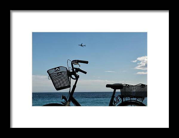 French Riviera Framed Print featuring the photograph Bicycle at seashore by Jean-Marc PAYET
