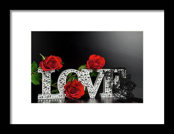 big white letters LOVE red roses on black background Framed Print by Golden  Shark - Fine Art America