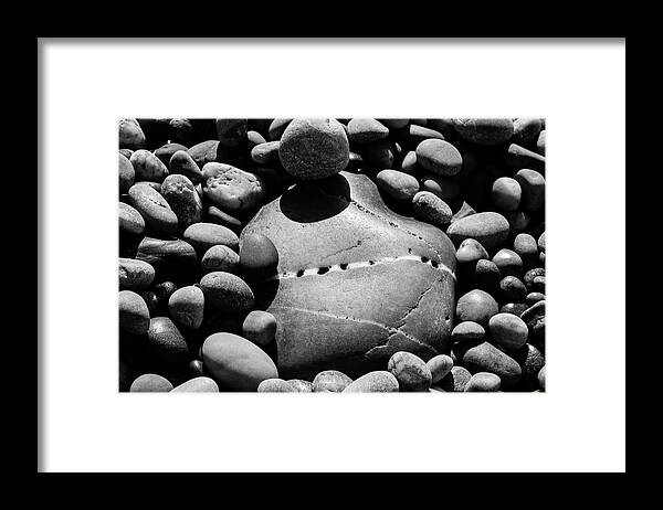 United Kingdom Framed Print featuring the photograph Black and White Pebbles by Richard Donovan