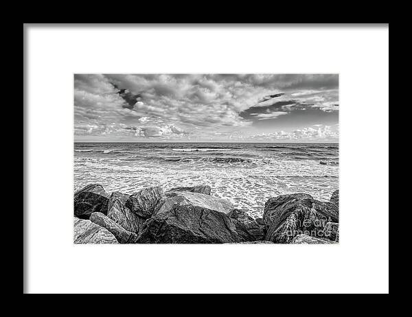 Fujifilm Framed Print featuring the photograph Black and White Whitby rocky seafront. UK by Pics By Tony