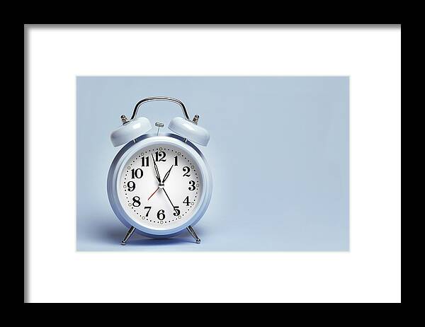 Single Object Framed Print featuring the photograph Blue Alarm Clock by Peter Dazeley