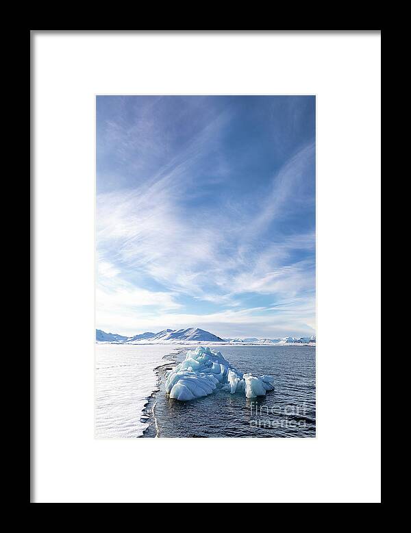 Frozen Framed Print featuring the photograph Blue iceberg in Svalbard by Jane Rix