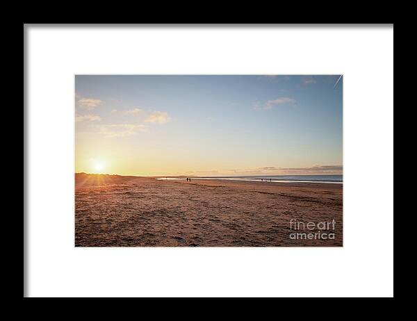 Brancaster Framed Print featuring the photograph Brancaster Beach North Norfolk at sunset by Simon Bratt