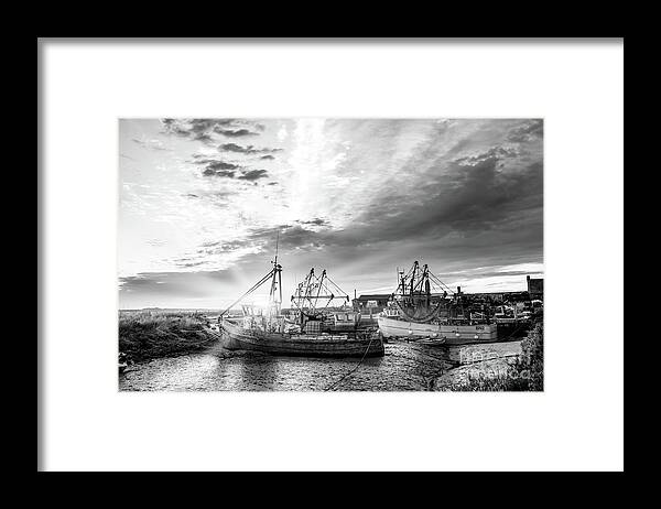 Norfolk Framed Print featuring the photograph Brancaster Norfolk fishing trawlers at sunrise BW by Simon Bratt