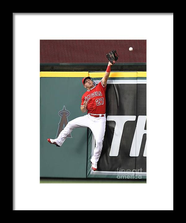 Second Inning Framed Print featuring the photograph Brandon Belt and Mike Trout by John Mccoy