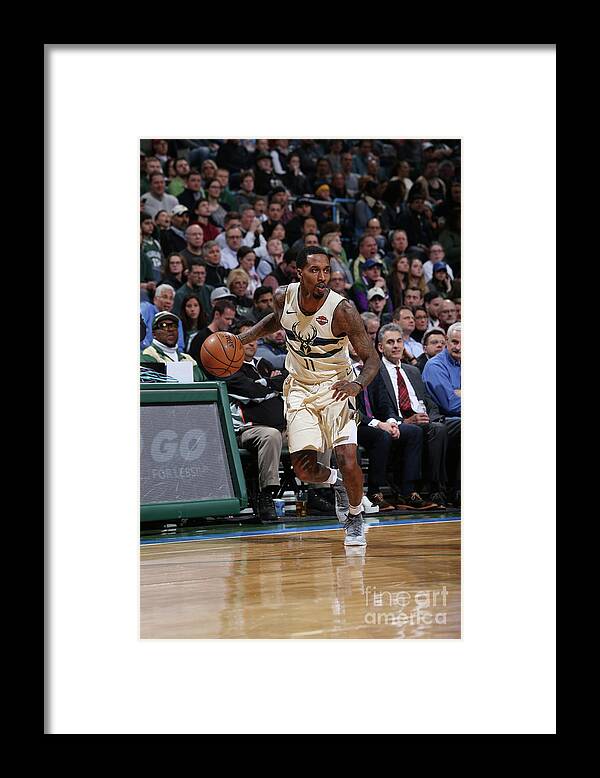 Nba Pro Basketball Framed Print featuring the photograph Brandon Jennings by Gary Dineen