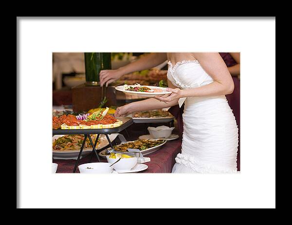 People Framed Print featuring the photograph Bride getting food from buffet. by RK Studio/Dean Sanderson