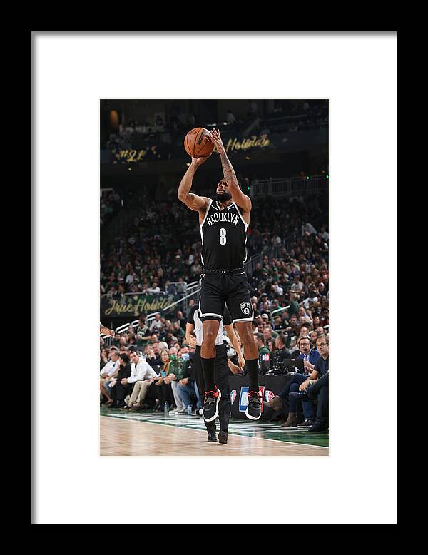Patty Mills Framed Print featuring the photograph Brooklyn Nets v Milwaukee Bucks by Gary Dineen