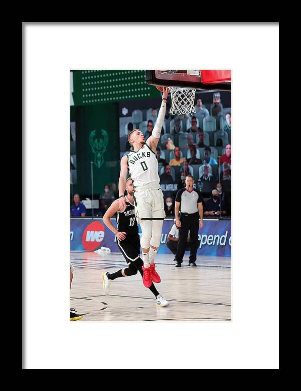 Nba Pro Basketball Framed Print featuring the photograph Brooklyn Nets v Milwaukee Bucks by Joe Murphy