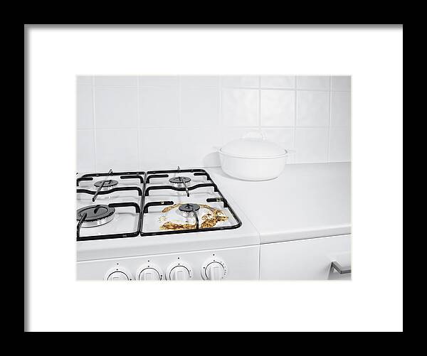 Milk Framed Print featuring the photograph Burned milk stain on gas stove by Jonathan Knowles
