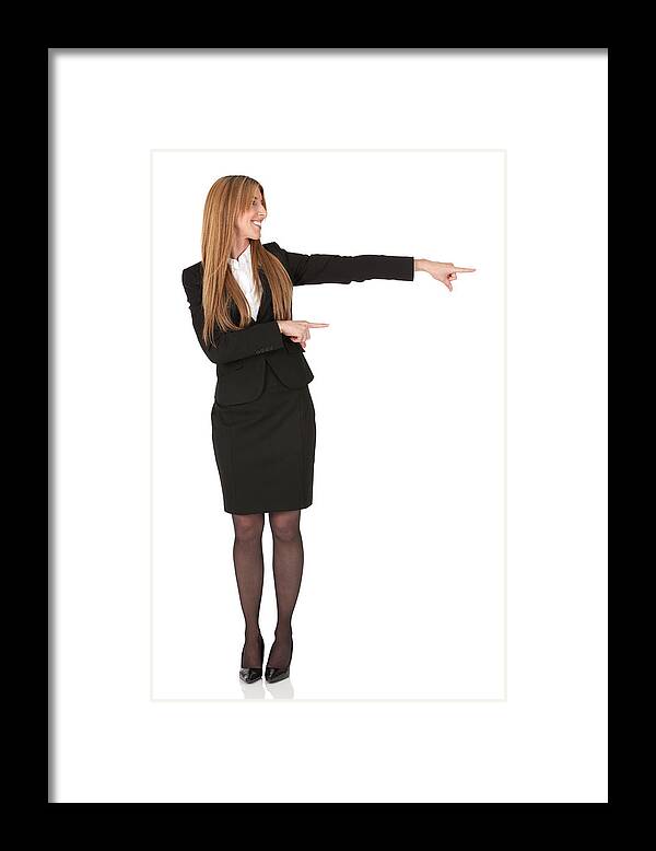 Stiletto Framed Print featuring the photograph Businesswoman pointing sideways by 4x6