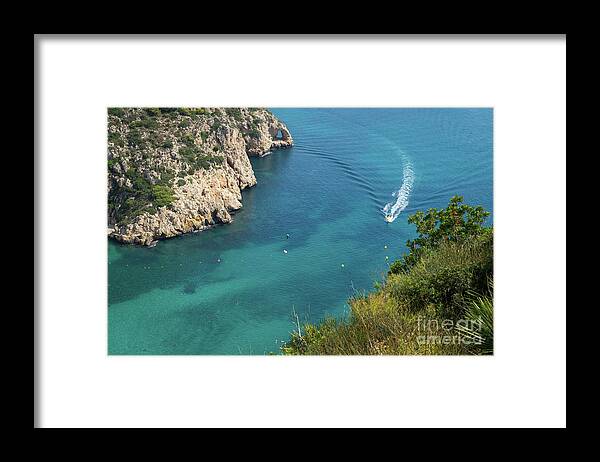 Mediterranean Sea Framed Print featuring the photograph Cala de la Granadella, boat trip on the Mediterranean Sea by Adriana Mueller