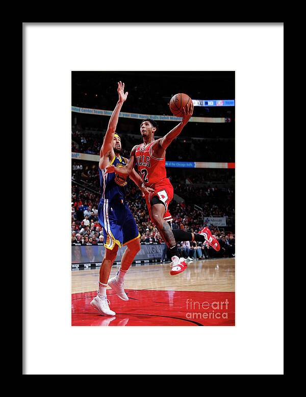 Cameron Payne Framed Print featuring the photograph Cameron Payne and Klay Thompson by Jeff Haynes