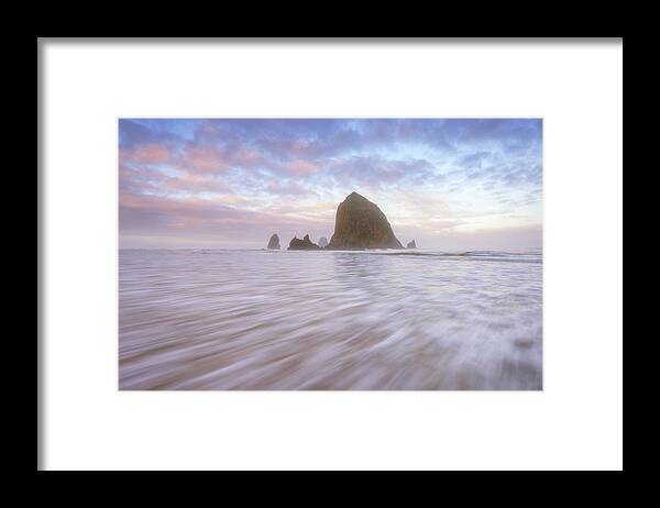 Cannon Beach Framed Print featuring the photograph Cannon Beach Rush by Darren White