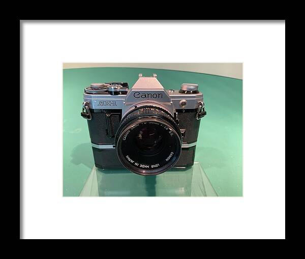 Canon Ae-1 With Motor Winder Framed Print featuring the photograph Canon AE-1 with motor winder by Lawrence Christopher