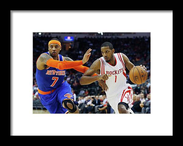 Drive Framed Print featuring the photograph Carmelo Anthony and Trevor Ariza by Scott Halleran