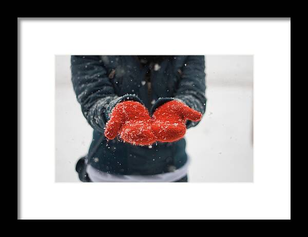 Orange Color Framed Print featuring the photograph Catching snowflakes by Jude Evans