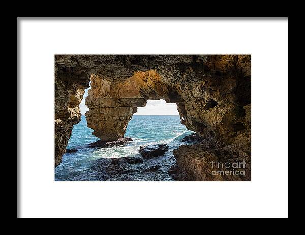 Coast Framed Print featuring the photograph Cave on the Mediterranean coast, Cova del Arcs by Adriana Mueller