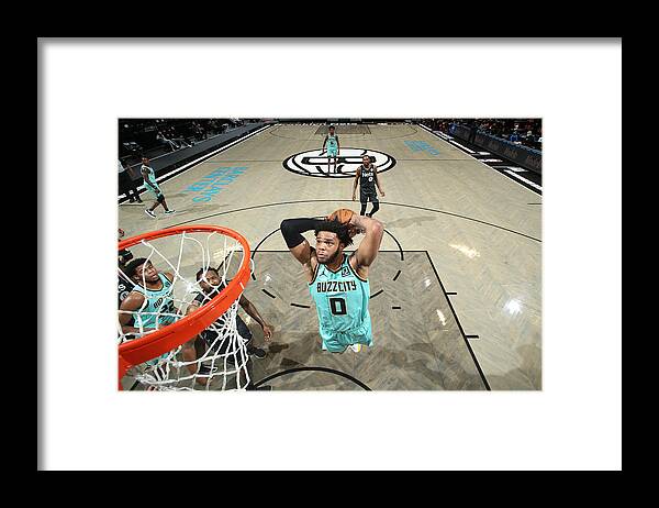 Nba Pro Basketball Framed Print featuring the photograph Charlotte Hornets v Brooklyn Nets by Nathaniel S. Butler