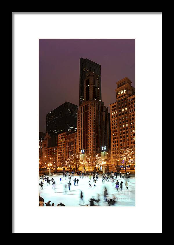 City Framed Print featuring the photograph Chicago at winter time with ice-rink in Millennium Park. by Gunther Allen
