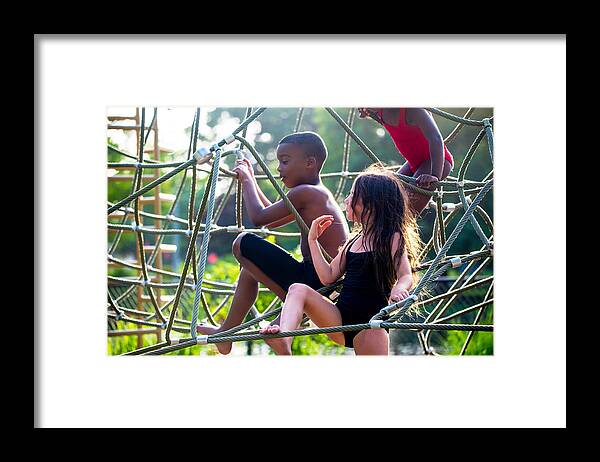 Child Framed Print featuring the photograph Children playing at the park. by Fran Polito