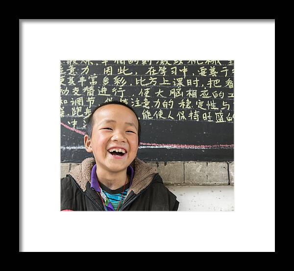 Preschool Building Framed Print featuring the photograph Chinese School boy, looking at camera, cheerful by Pidjoe