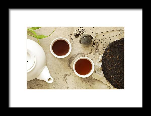 Chinese Culture Framed Print featuring the photograph Chinese tea. Pu erh Puerh Tea Cake. by AnjelaGr